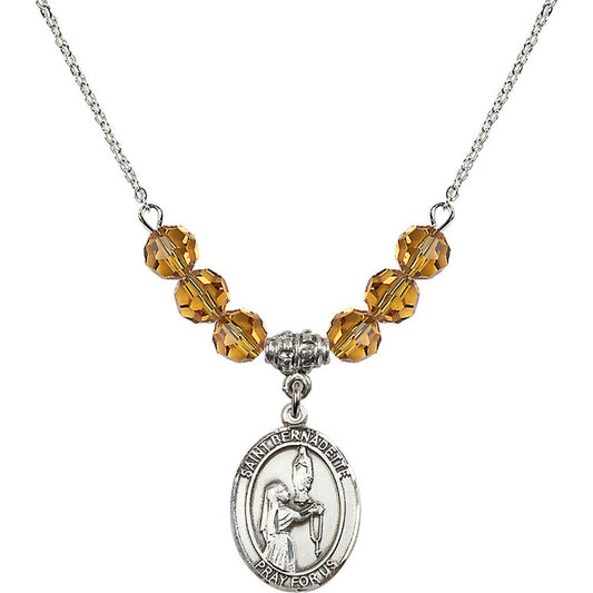 Sterling Silver Saint Bernadette Birthstone Necklace with Topaz Beads - 8017