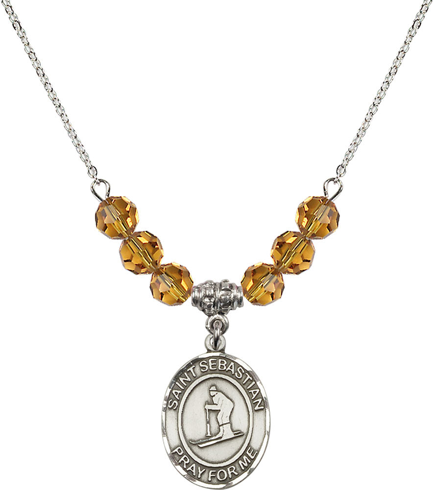 Sterling Silver Saint Sebastian/Skiing Birthstone Necklace with Topaz Beads - 8169
