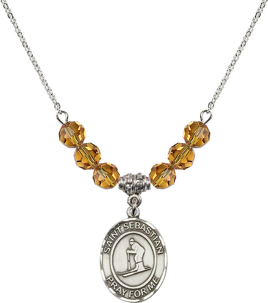 Sterling Silver Saint Sebastian/Skiing Birthstone Necklace with Topaz Beads - 8169